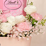 Charming Pink Basket with Flowers, Lindt Chocolates & Candle