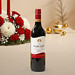 Candle and Flower Centerpeice with Wine & Plum Cake