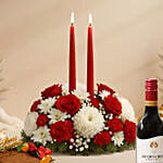 Candle and Flower Centerpeice with Wine & Plum Cake