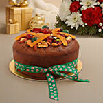 Candle and Flower Centerpiece with Wine and Fruity Plum Cake