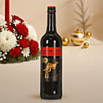 Candle and Flower Centerpiece with Wine and Fruity Plum Cake