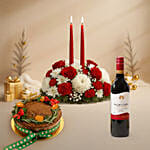 Candle and Flower Centerpeice with Wine and Plum Cake