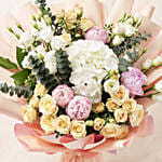 Ravishing Mixed Flowers Wrapped Bouquet