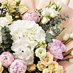 Ravishing Mixed Flowers Wrapped Bouquet
