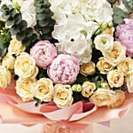 Ravishing Mixed Flowers Wrapped Bouquet