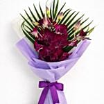 Purple orchid bouquet with satin ribbon