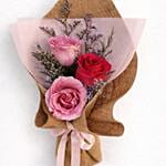 Elegant rose bouquet with burlap wrap