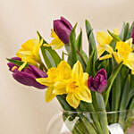 Daffodils and Tulips Beauty in Fish Bowl Arrangement