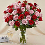 50 Vivid Red and Pink Roses In Vase