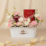 Charming Pink Basket with Flowers, Lindt Chocolates & Candle