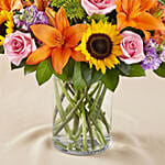 Vibrant Bunch of Flowers In Glass Vase