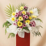 Gerberas Purple Pom In Beautiful Red Stand