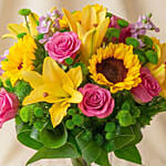 Sparkling Bunch of Flowers In Glass Vase