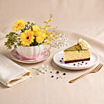 Sunny Teacup Flower Arrangement & Cheesecake Slice