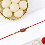 Sacred Om Designer Rakhi with Rasgulla