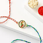 Multicolor Peacock Rakhi with Blue and Red Thread with Dryfruits
