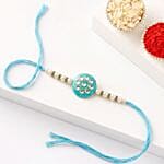 Sneh Mesmerising Kundan Sky Blue Rakhi for Brothers