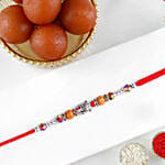 Sneh Striking Feng Shui Turtle Rakhi with Gulab Jamun