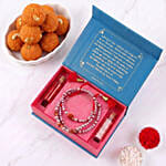 Pearls and Rudraksha Rakhi with Motichoor Ladoo