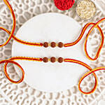 Auspicious Rudraksha Rakhi Set with Motichoor Ladoo