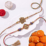 Divine Duo Radha Krishna and Ganesha Rakhi Set with Motichoor Ladoo