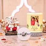 Ganesha Idol with Peacock Rakhi and Personalised Speaker Gift Set