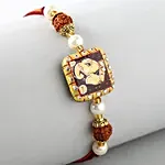 Ganesha Idol with Devotional Ganesha Rakhi and Peace Lily Plant Gift Set