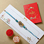 Divine Ganesha Idol and Krishna Rakhi with LED Lamp Gift Set