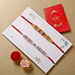 Red & Green Designer and Pearl Rakhi Set