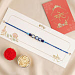 Minamalistic Navy Evil Eye Rakhi with Motichoor Ladoo