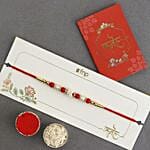 Ethnic Pearl Rakhi with Green Pea Cookies