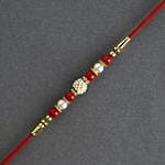 Ethnic Pearl Rakhi with Green Pea Cookies