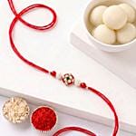 Crimson Pearl Floral Rakhi with Rasgullas
