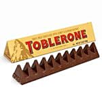 Crimson Pearl Floral Rakhi with Toblerones