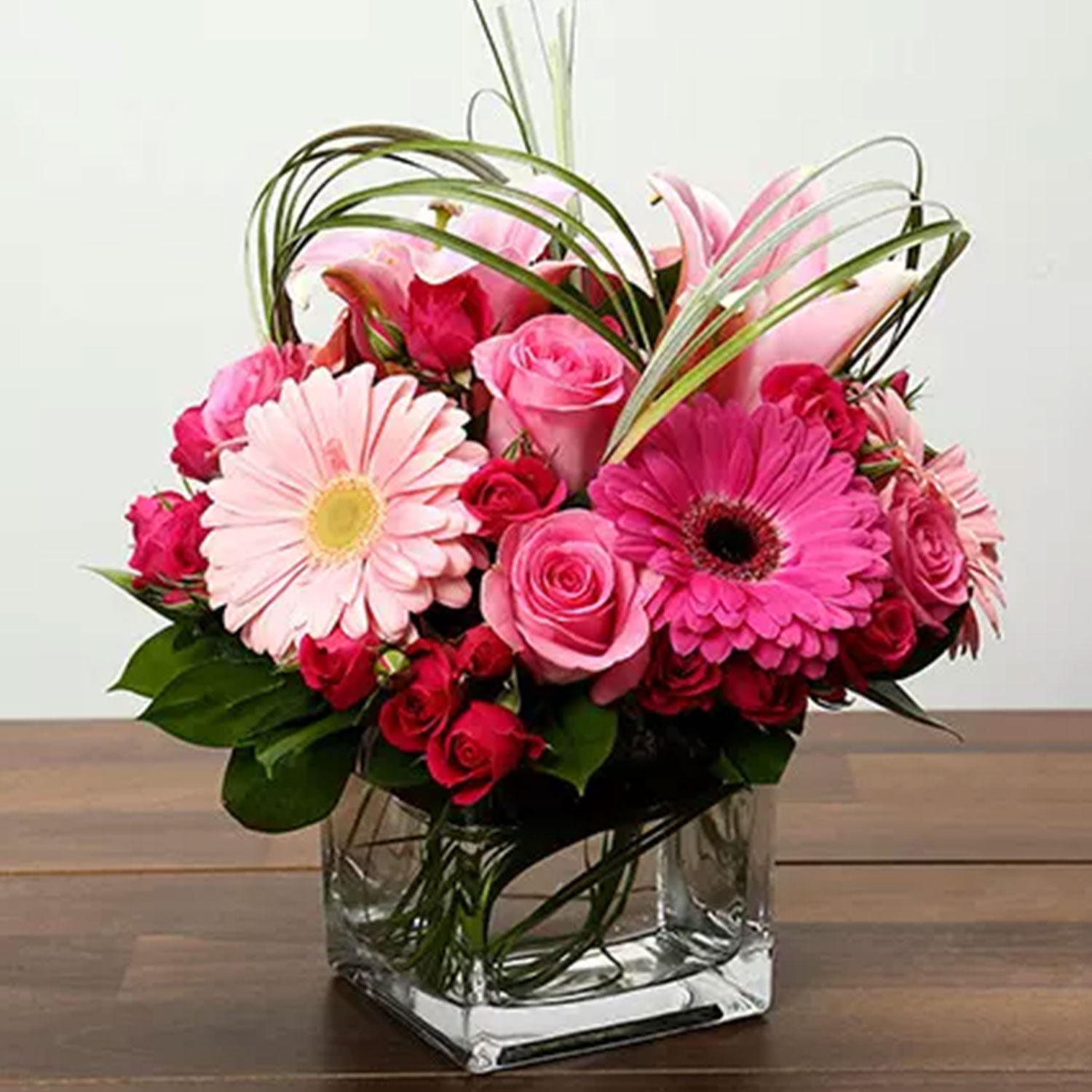 Pink Flowers Bunch In Glass Vase Delivery in Singapore - FNP SG