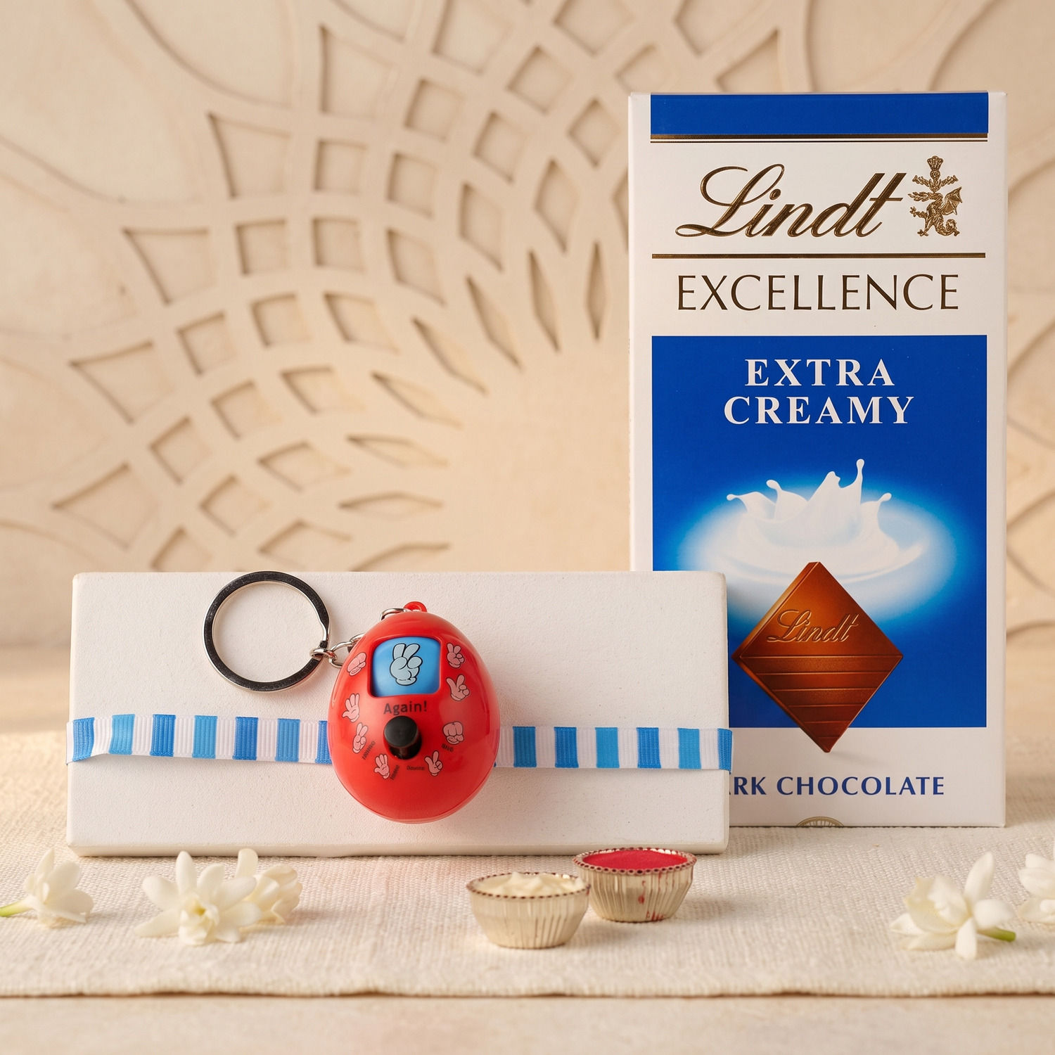 Push Button Game Keychain Rakhi N Lindt Chocolate Delivery in Singapore ...